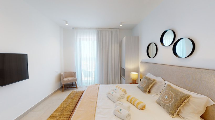 Imagen de la habitación del Hotel Periyiali Konnos Villas Beach Resort. Foto 1