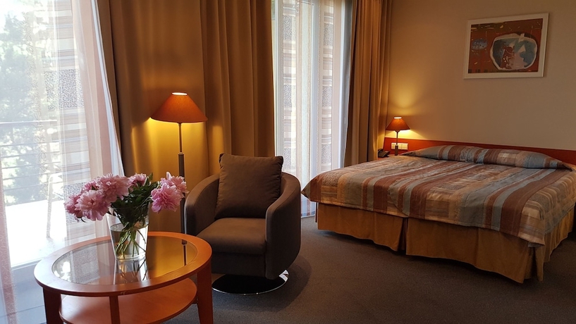 Imagen de la habitación del Hotel Perkuno Namai. Foto 2