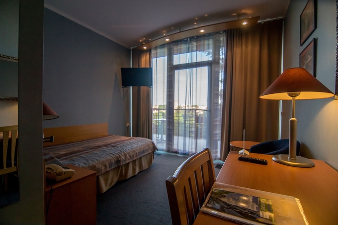 Imagen de la habitación del Hotel Perkuno Namai. Foto 5