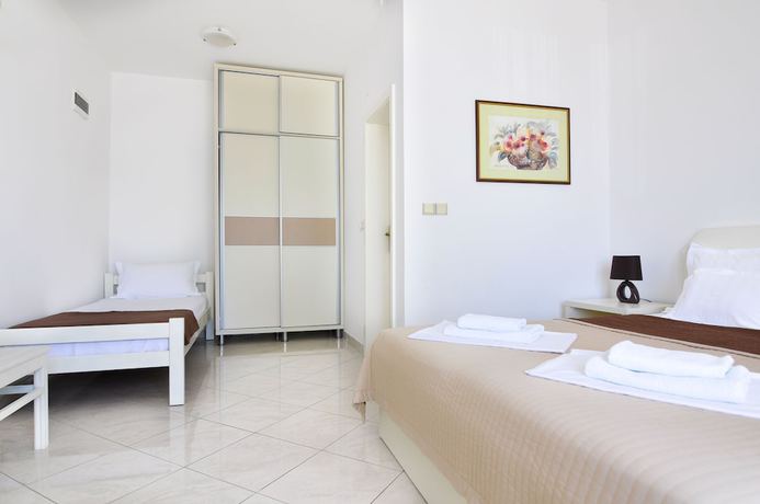 Imagen de la habitación del Hotel Perla Annexes. Foto 14