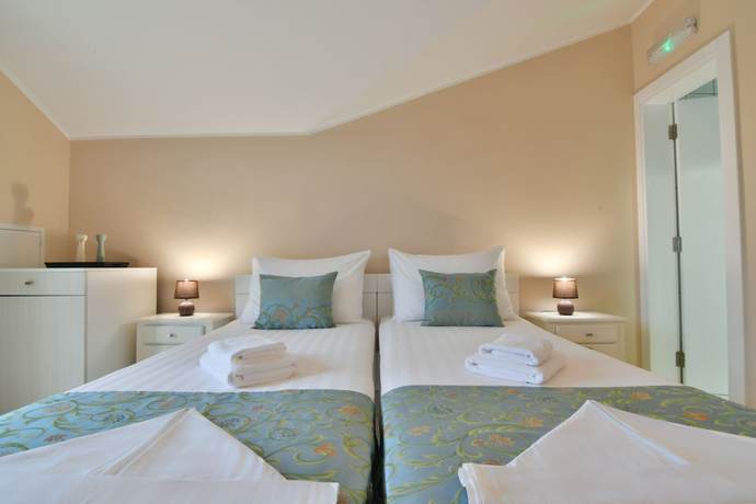 Imagen de la habitación del Hotel Perla Annexes. Foto 15