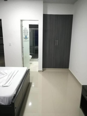 Imagen de la habitación del Hotel Perla Azul. Foto 8