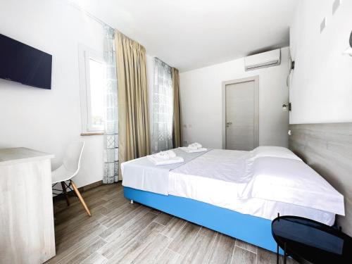 Imagen de la habitación del Hotel Perla Blu Tropea. Foto 18