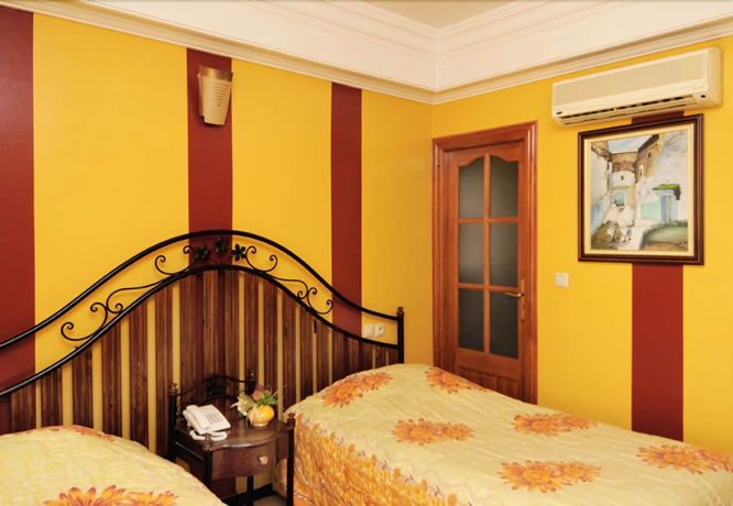 Imagen de la habitación del Hotel Perla, Fez. Foto 9