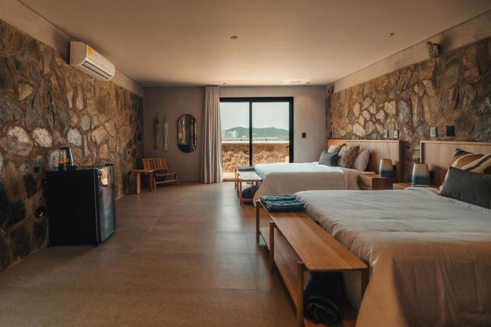 Imagen de la habitación del Hotel Perla Roca Boutique - Beach Front. Foto 6