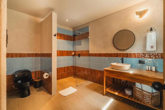 Imagen de la habitación del Hotel Perla Roca Boutique - Beach Front. Foto 7