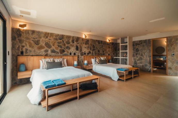 Imagen de la habitación del Hotel Perla Roca Boutique - Beach Front. Foto 8
