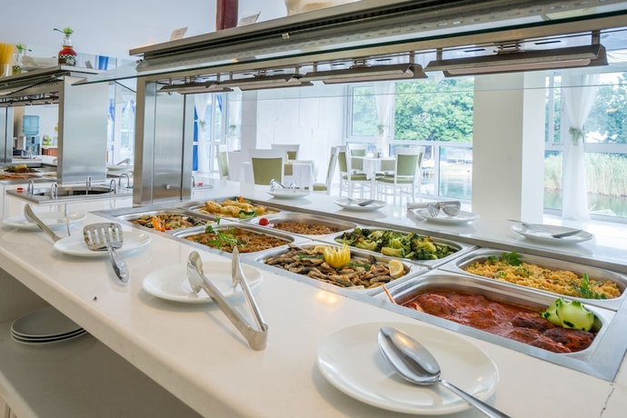 Imagen del bar/restaurante del Hotel Perla Royal. Foto 7