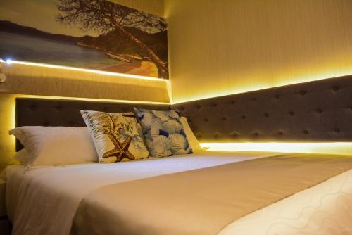 Imagen de la habitación del Hotel Perla Suite. Foto 7