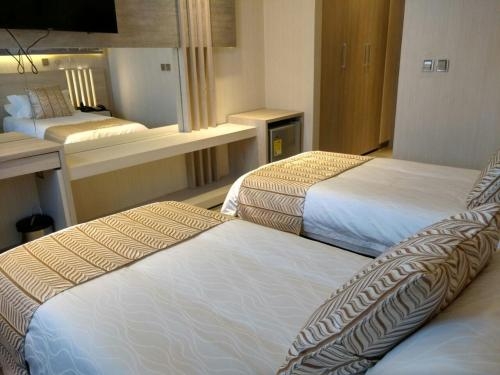 Imagen de la habitación del Hotel Perla Suite. Foto 8