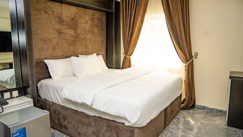 Imagen de la habitación del Hotel Perly Gate Residence. Foto 6