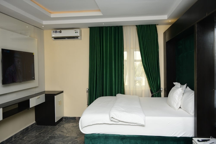 Imagen de la habitación del Hotel Perly Gate Residence. Foto 7