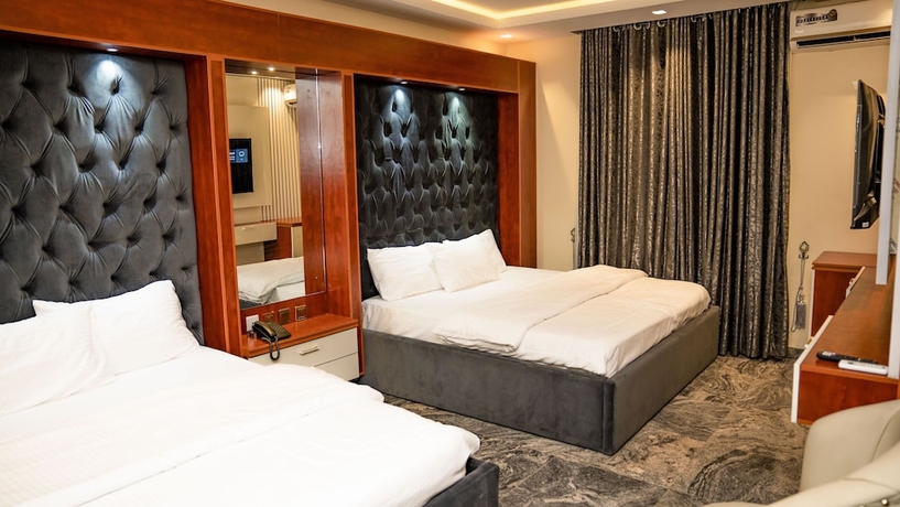 Imagen de la habitación del Hotel Perly Gate Residence. Foto 9