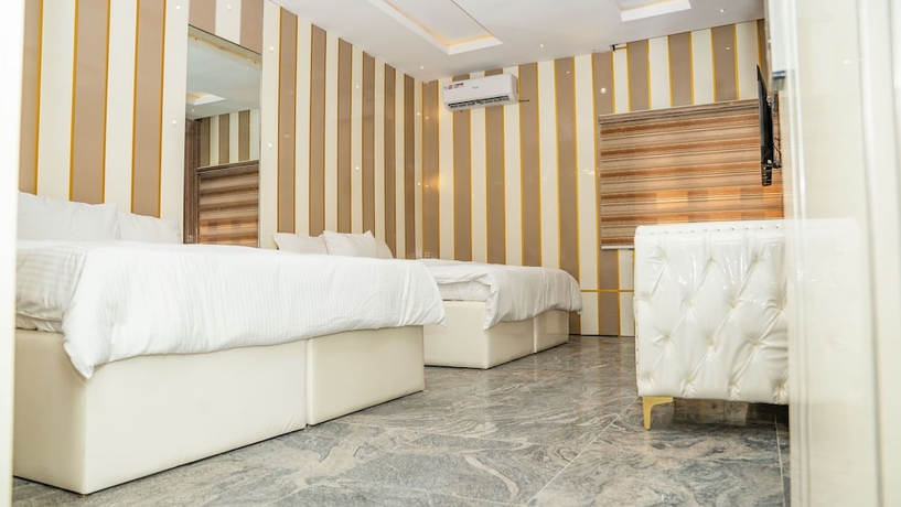 Imagen de la habitación del Hotel Perly Gate Residence. Foto 10