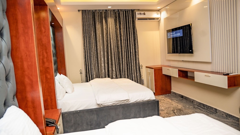 Imagen de la habitación del Hotel Perly Gate Residence. Foto 11