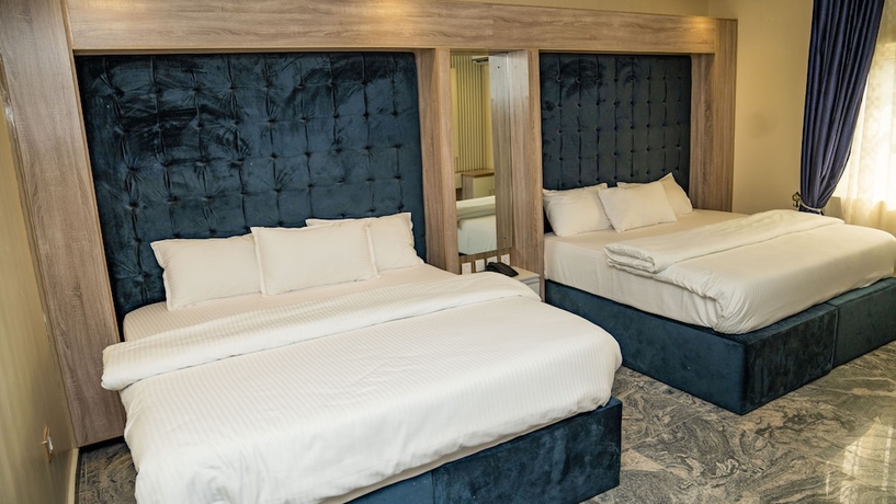 Imagen de la habitación del Hotel Perly Gate Residence. Foto 12