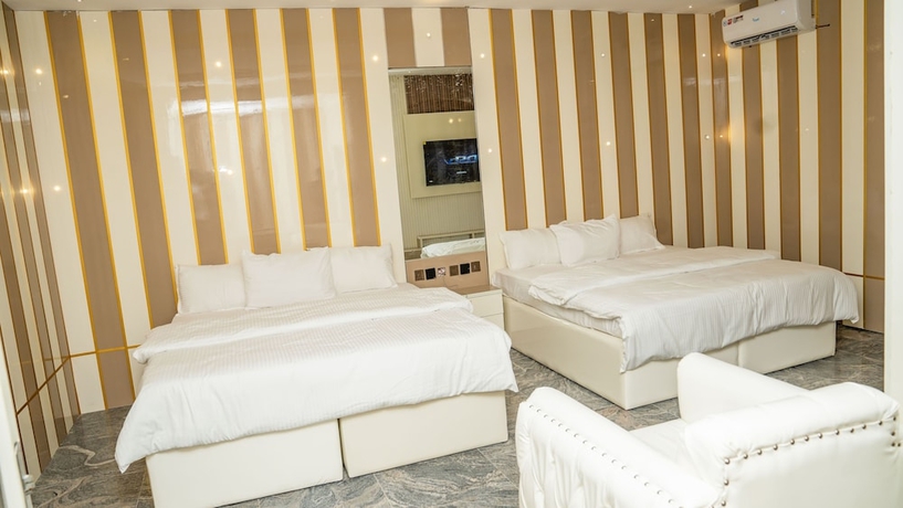 Imagen de la habitación del Hotel Perly Gate Residence. Foto 14