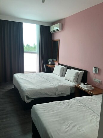 Imagen de la habitación del Hotel Permai Hotel. Foto 14