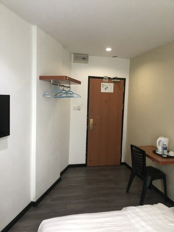 Imagen de la habitación del Hotel Permai Hotel. Foto 18
