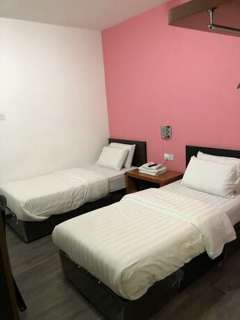 Imagen de la habitación del Hotel Permai Hotel. Foto 20