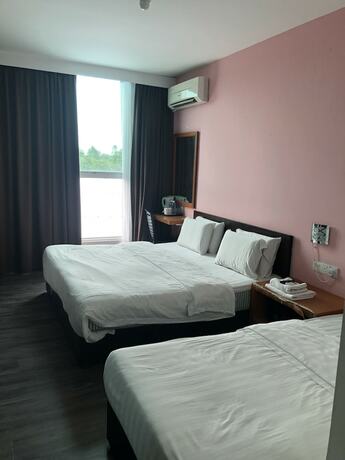 Imagen de la habitación del Hotel Permai Hotel. Foto 21