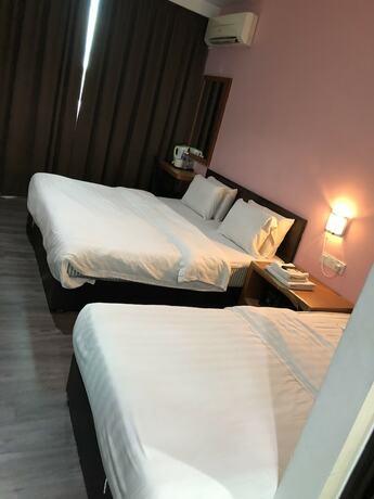 Imagen de la habitación del Hotel Permai Hotel. Foto 22