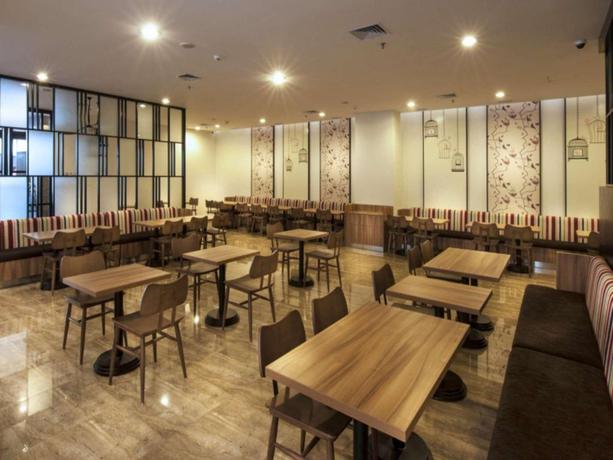 Imagen del bar/restaurante del Hotel Permata, Bogor. Foto 4