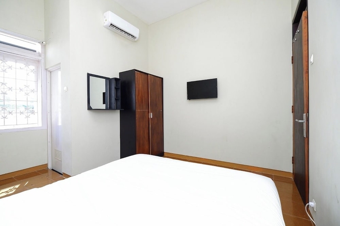 Imagen de la habitación del Hotel Permata GuestBDoctor. Foto 8