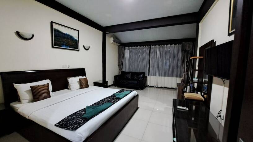 Imagen de la habitación del Hotel Permata Hijau. Foto 18