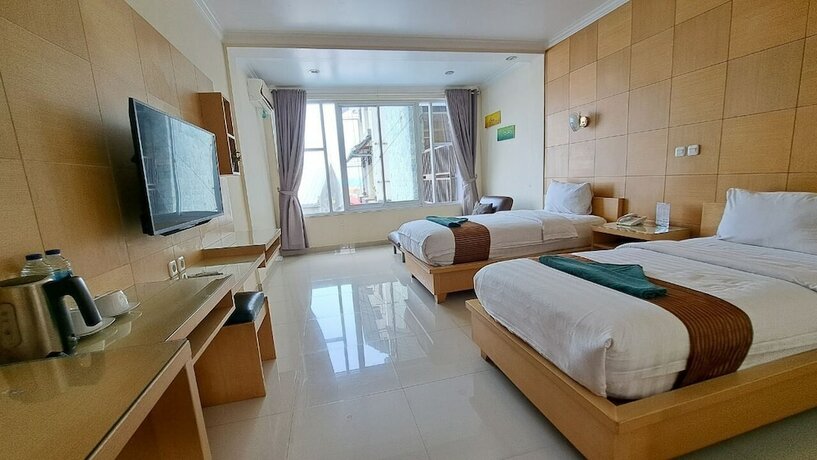 Imagen de la habitación del Hotel Permata Hijau. Foto 26