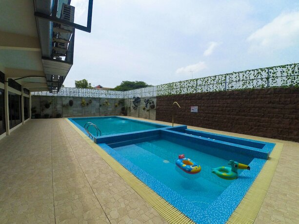 Imagen de la piscina del Hotel Permata Hijau. Foto 39
