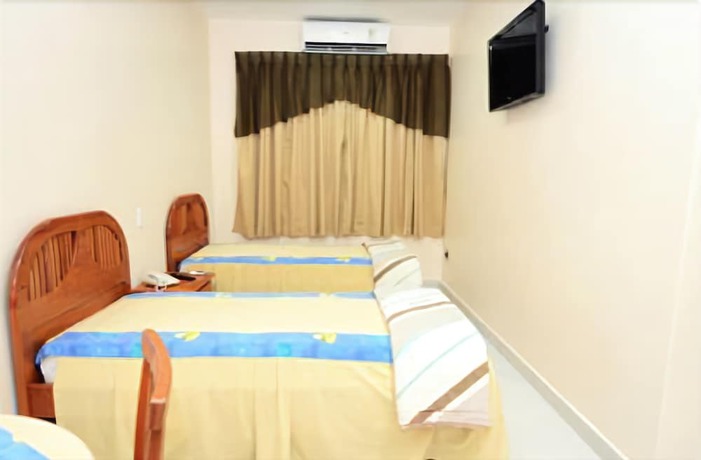 Imagen de la habitación del Hotel Perolas. Foto 3