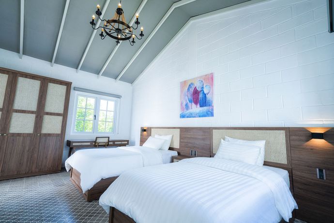 Imagen de la habitación del Hotel Perolas Villas Resort. Foto 1