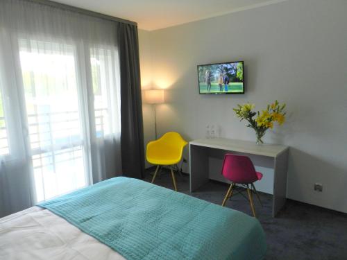 Imagen de la habitación del Hotel Perłowy. Foto 7