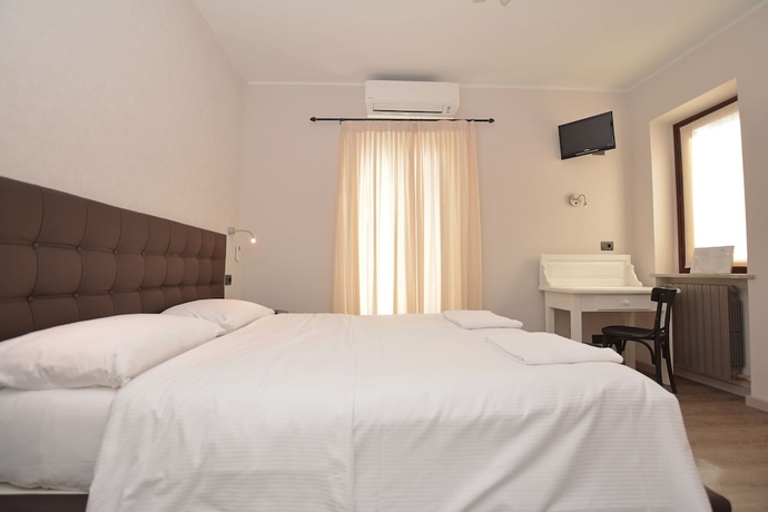 Imagen de la habitación del Hotel Perpoin. Foto 3