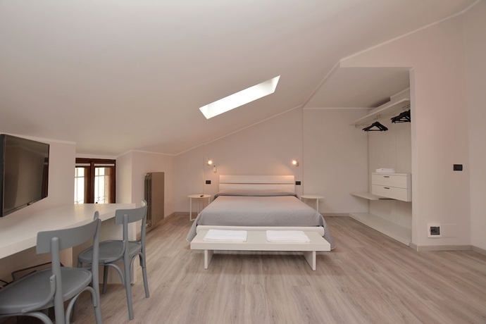 Imagen de la habitación del Hotel Perpoin. Foto 7