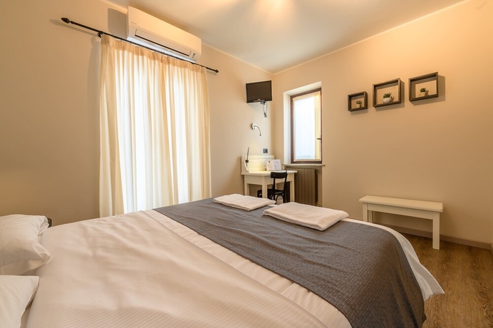 Imagen de la habitación del Hotel Perpoin. Foto 9