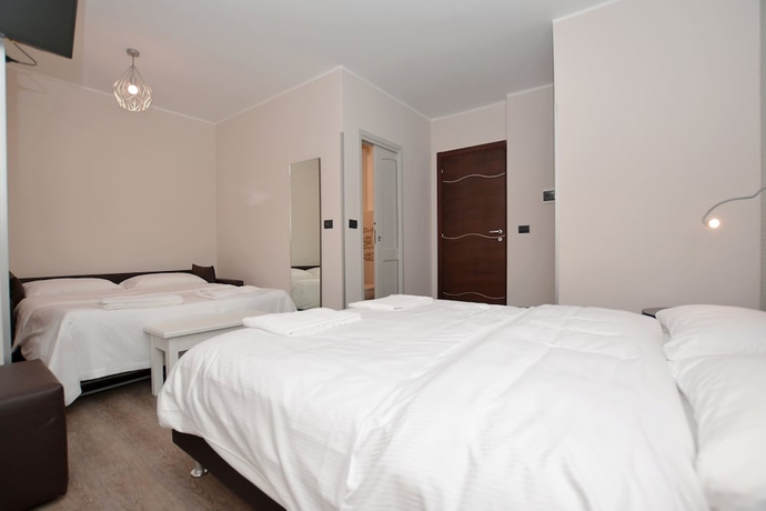 Imagen de la habitación del Hotel Perpoin. Foto 11