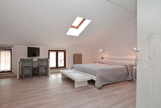 Imagen de la habitación del Hotel Perpoin. Foto 12