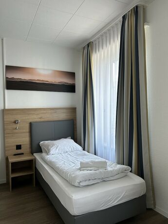 Imagen de la habitación del Hotel Perron 10. Foto 17