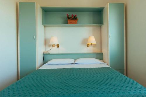 Imagen de la habitación del Hotel Perrozzi. Foto 9