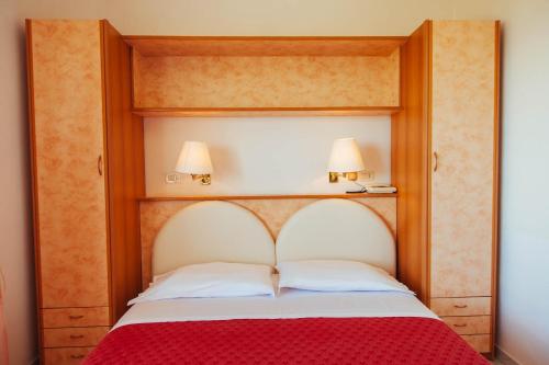 Imagen de la habitación del Hotel Perrozzi. Foto 10