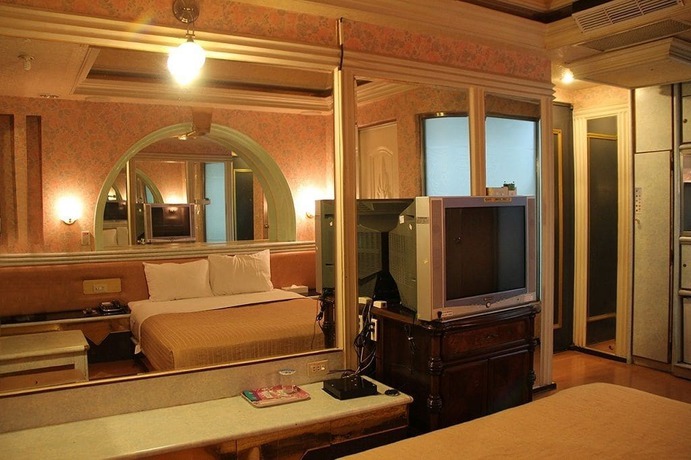 Imagen de la habitación del Hotel Persimmon. Foto 18