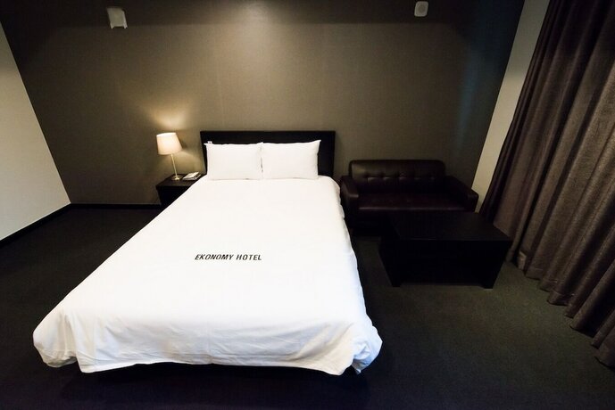 Imagen de la habitación del Hotel Persimmon Tourist. Foto 16