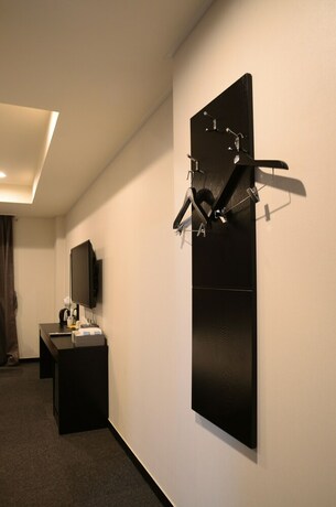 Imagen de la habitación del Hotel Persimmon Tourist. Foto 26