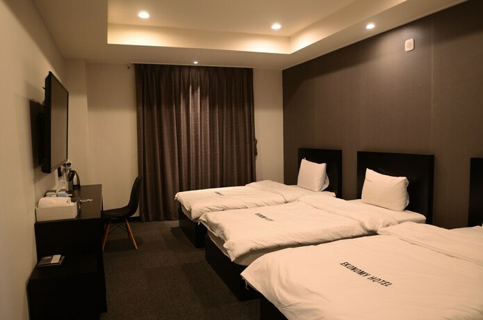 Imagen de la habitación del Hotel Persimmon Tourist. Foto 35