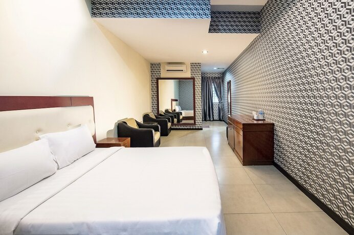 Imagen de la habitación del Hotel Pertama Lodge. Foto 16