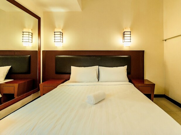 Imagen de la habitación del Hotel Pertama Lodge. Foto 17