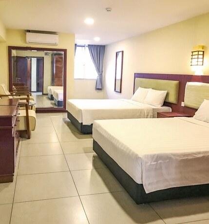 Imagen de la habitación del Hotel Pertama Lodge. Foto 18
