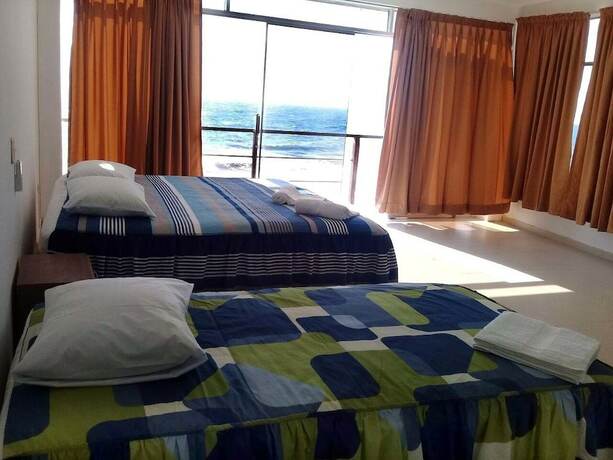 Imagen de la habitación del Hotel Peru Hosting De Punta Sal. Foto 16